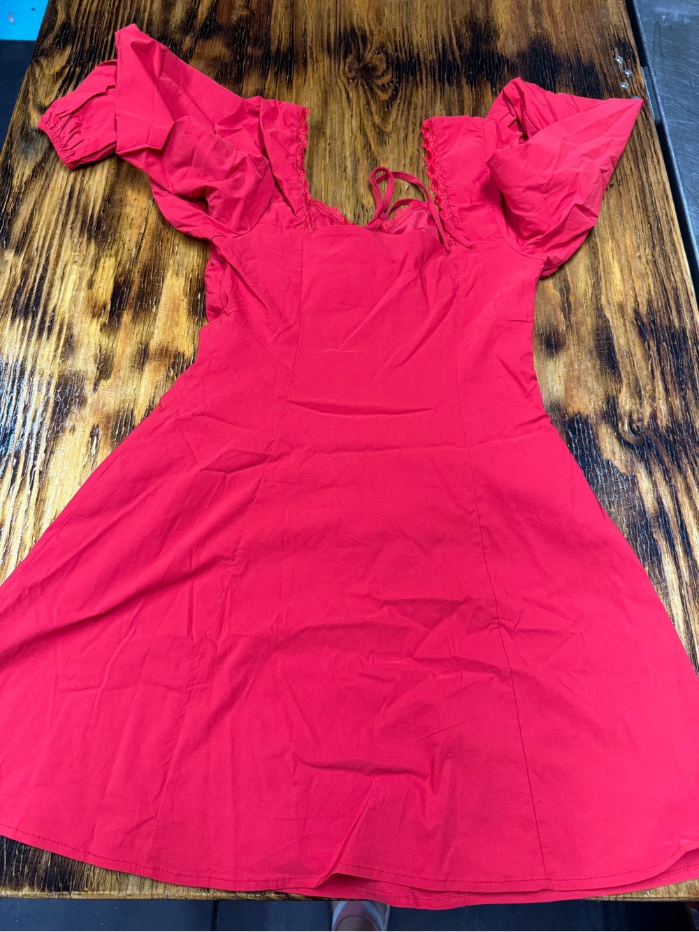 Label Photo of Red Women's Top